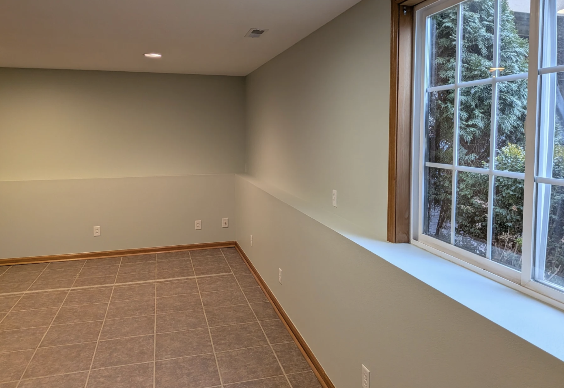Finished basement interior painting project by Green Oaks Painting